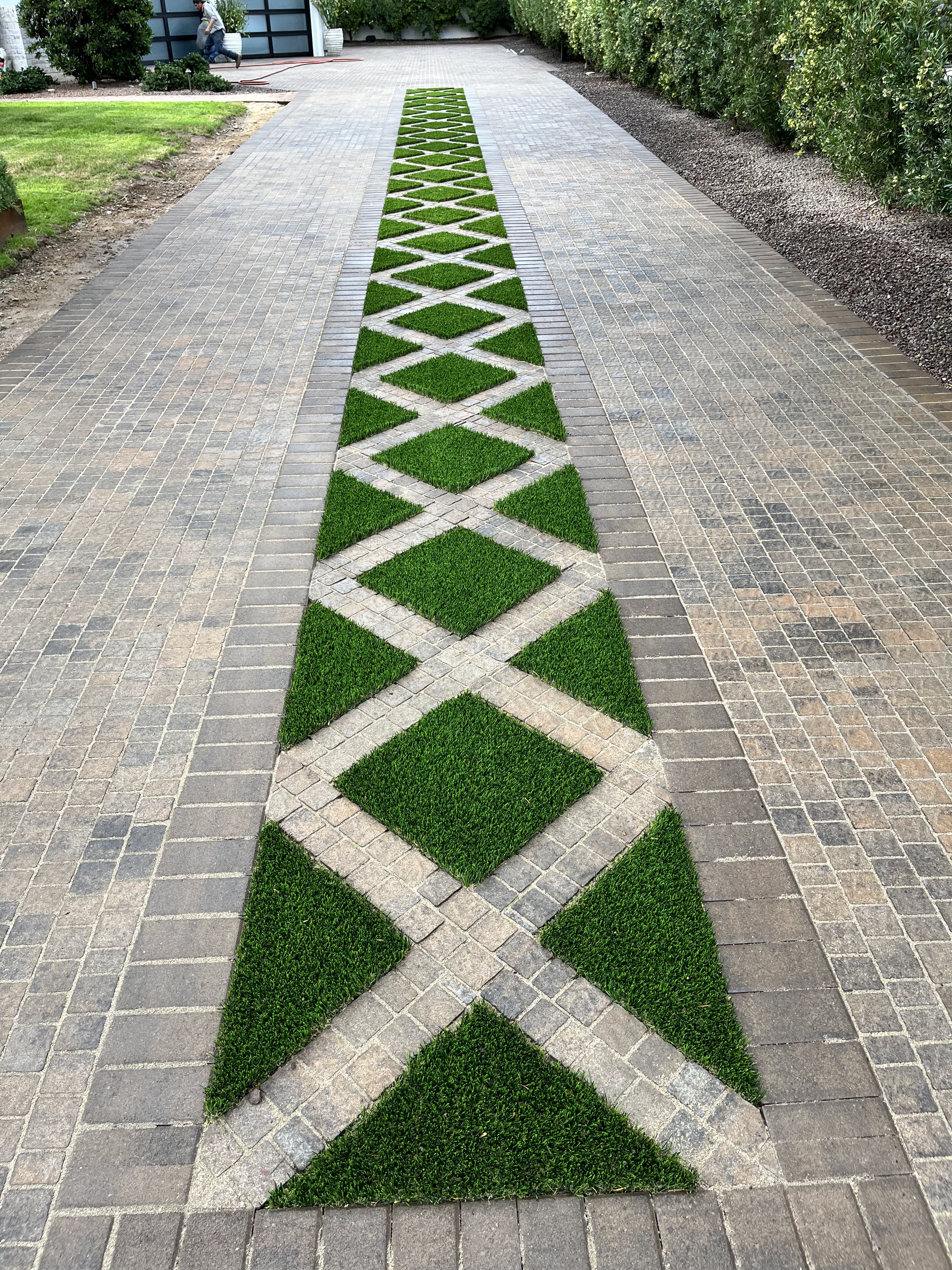Turf & Paver Driveway Inlay — landscaping project in Surprise, AZ by Sophora Landscaping
