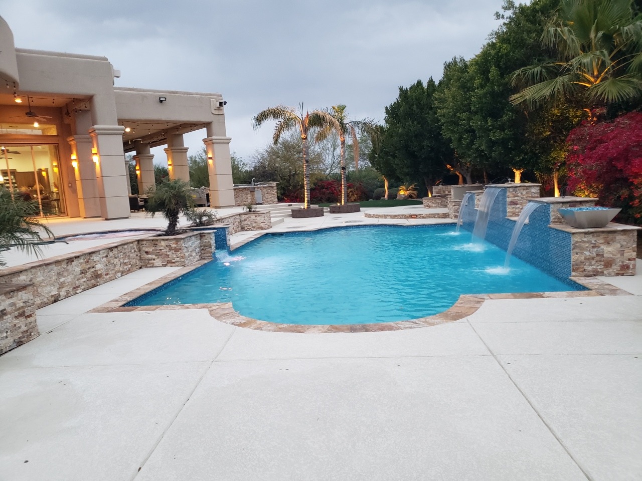 Resort-Style Pool Oasis & Water Features — landscaping project in Surprise, AZ by Sophora Landscaping